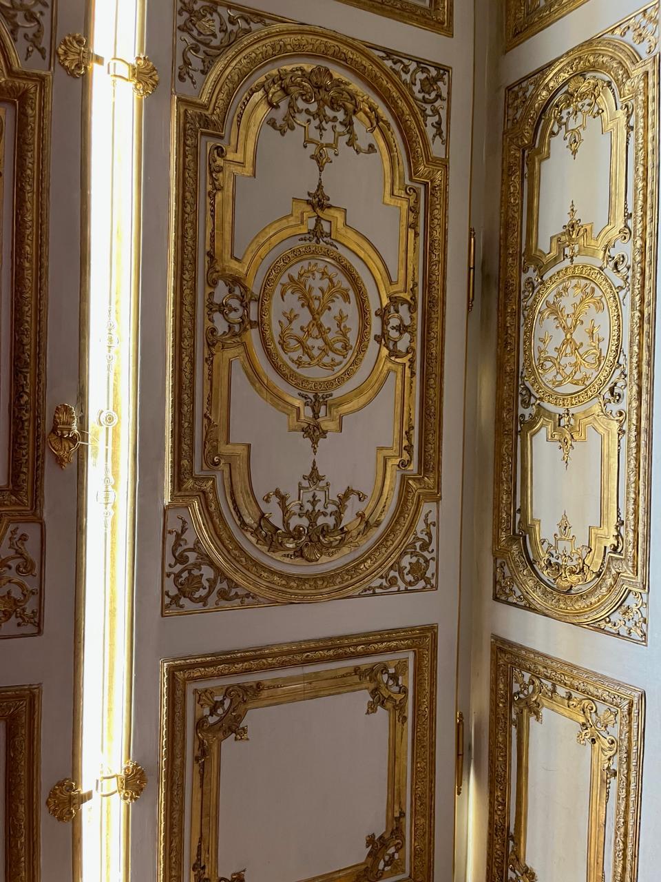 Gilded door panels at Versailles